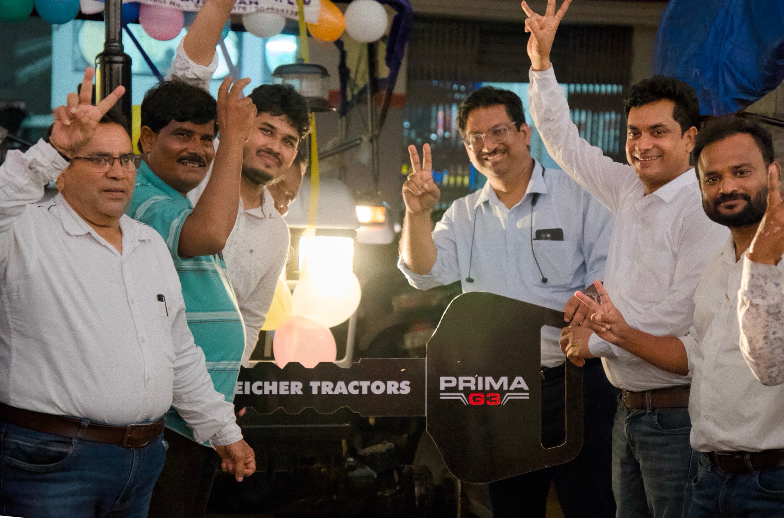 The Align Agrotech team celebrating a new Eicher PRIMA G3 tractor delivery at the branch